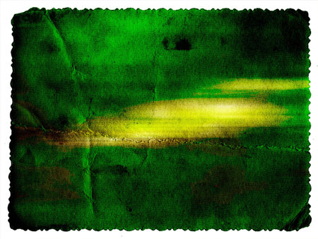 Pastel colored vintage textured card with carved edge isolated on whiteの写真素材