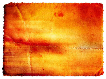 Pastel colored vintage textured card with carved edge isolated on whiteの写真素材