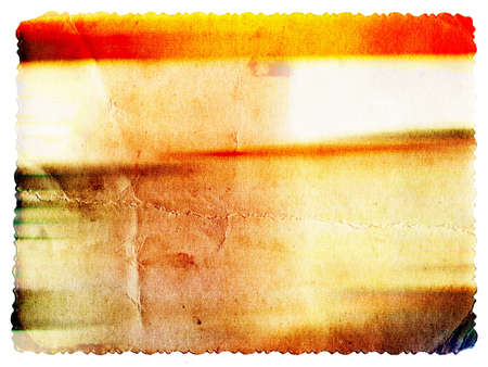 Pastel colored vintage textured card with carved edge isolated on whiteの写真素材