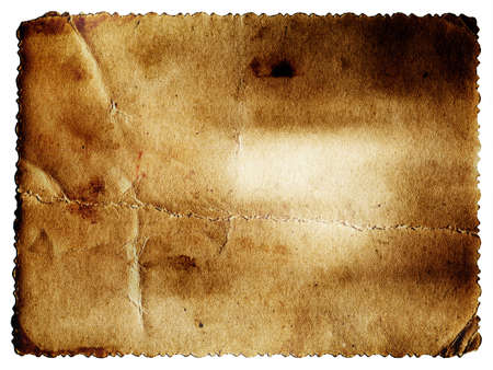 Pastel colored vintage textured card with carved edge isolated on whiteの写真素材