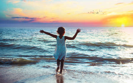 running to the seaの写真素材