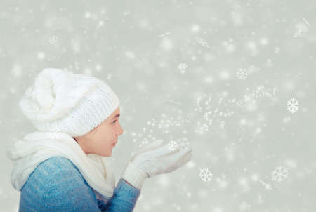 little girl blowing the starsの写真素材