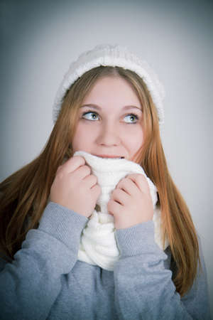 Portrait of a smilling teenager with a scarfの写真素材