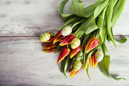 decorated eggs in the flowersの写真素材