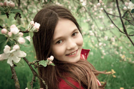 beauty girl near the apple treeの写真素材