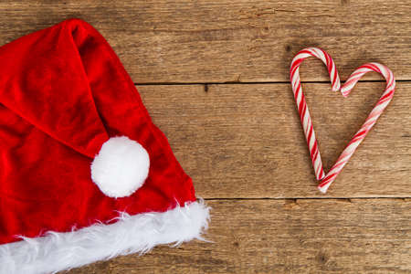 santa hat on wooden backgroundの写真素材