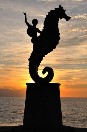 Seahorse statue at sunset in Puerto vallartaの写真素材