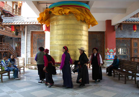China, October 2013,  Tibetan Prayer Wheel Turningのeditorial素材