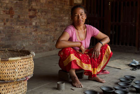 Bhaktapur, Nepal, 2013, Female Potterのeditorial素材
