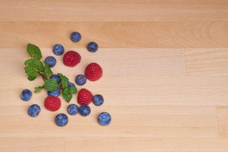 raspberries and blueberries from aboveの写真素材