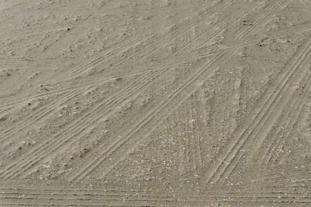 Tire tracks in the sandの写真素材