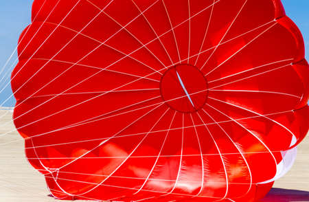 Red umbrella for parasailingの写真素材