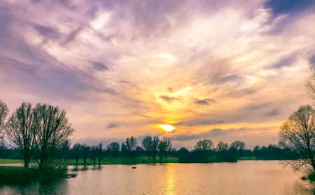 Beautiful lake landscape in the sunset in Kassel, Germanyの写真素材