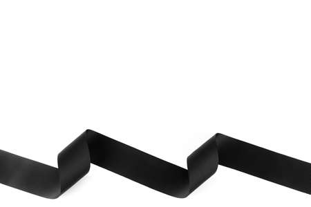 Black ribbon on white background, copy spaceの写真素材