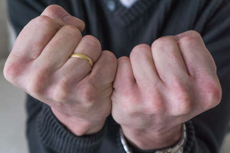 Fists clenched in close upの写真素材