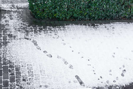 Footsteps in the snow, view from aboveの写真素材