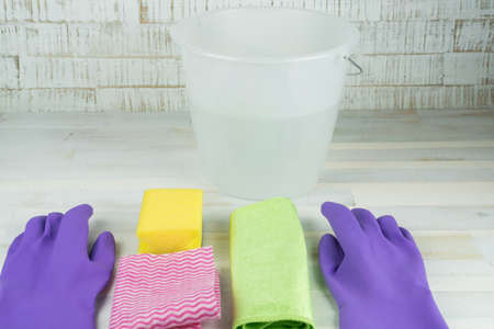 Spring cleaning, rubber gloves, bucket, sponge and cleaning ragの写真素材