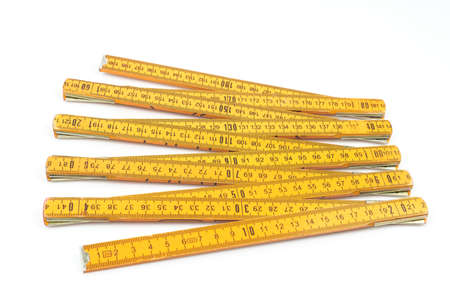 Yellow measure isolated on whiteの写真素材