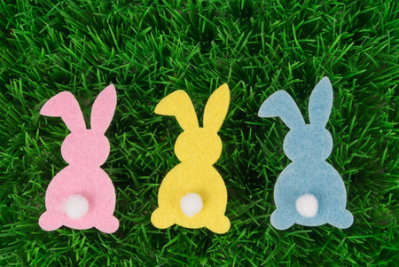 Easter bunnies in the grassの写真素材