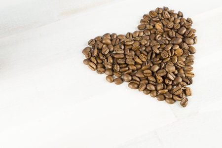 Coffee beans in the shape of a heartの写真素材