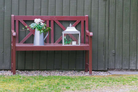 Wooden bench with decorationの写真素材