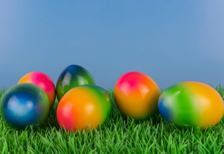 Colorful easter eggs in the meadow
