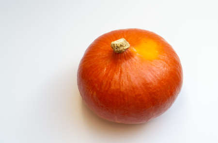 A hokkaido pumpkin isolated on whiteの写真素材