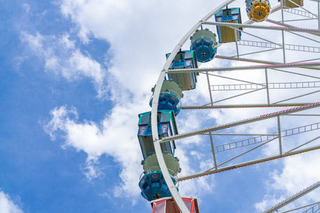 A beautiful old ferris wheel with blue sky background