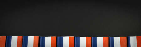 Banner with many french flags on black backgroundの写真素材