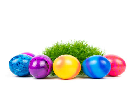 Easter basket with colorful Easter eggsの写真素材