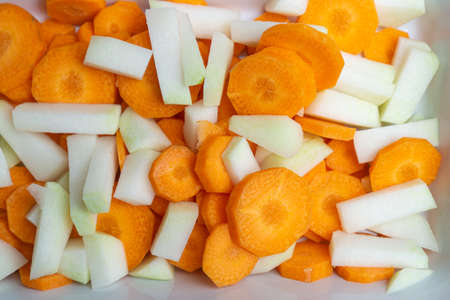 Freshly cut carrots and kohlrabiの写真素材