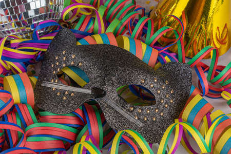 Eye mask to dress up in carnival and streamersの写真素材