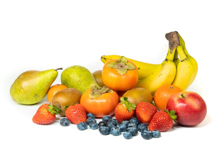 Lots of fresh fruit isolated on a white background, copy spaceの写真素材
