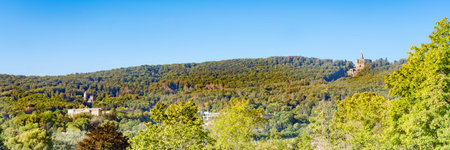 Panorama over the Habichtswald near Kassel with the famous Herkules, Loewenburg, Wilhelmshoehe Castle, Germanyの写真素材