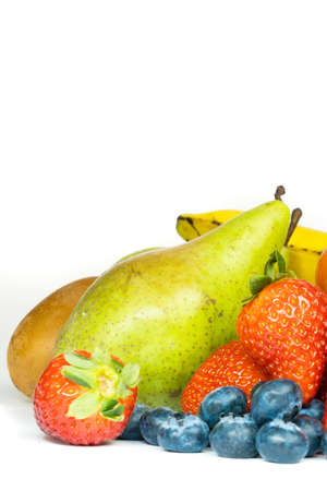Lots of fresh fruit isolated on a white background, copy spaceの写真素材