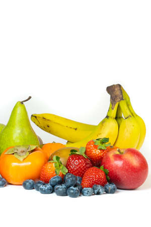 Lots of fresh fruit isolated on a white background, copy spaceの写真素材