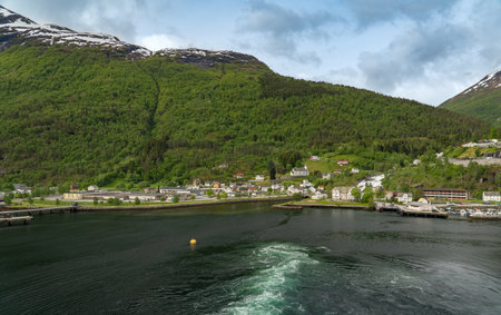 The small town of Hellesylt on the Sunnylvsfjord in Norwayの写真素材