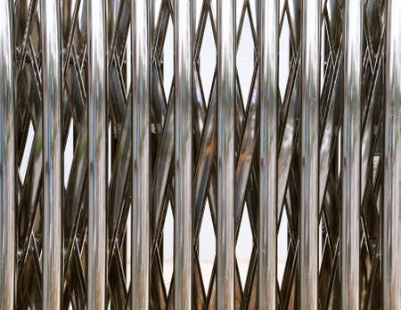 Close up view of a stainless steel cantiliever extendable door. の写真素材