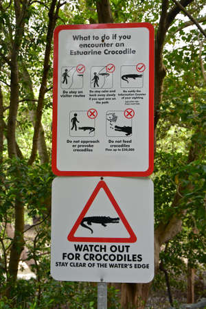 Crocodile warning signs giving safety advice for remining safe with crocodiles. の写真素材