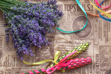 Lavender wads made from fresh organic lavender closeup, on craft paper. Beautiful handmade craft, wands, gift from natural summer flowers. Weaving with fresh lavender. Lavender spindlesの写真素材