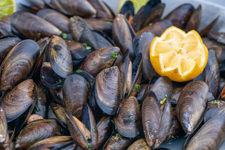 Close up of a plate with freshly coocked mussels , organic food