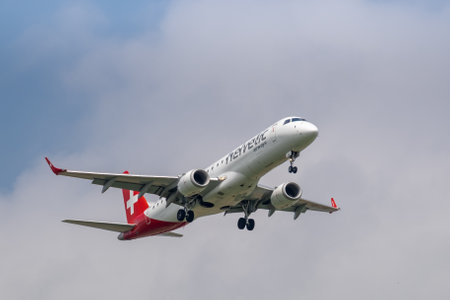 Madrid, Spain; April 10th 2021: Helvetic Airways Embraer 195 landing in Barajas airport.のeditorial素材