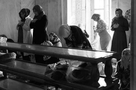 Istanbul, Turkey; May 25th 2013: Muslim women praying in the Blue Mosque.のeditorial素材