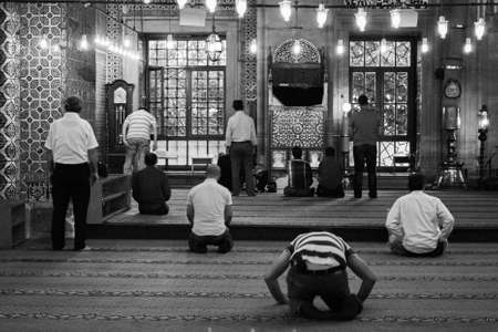 Istanbul, Turkey; May 27th 2013: Muslims praying in the New Mosque.のeditorial素材