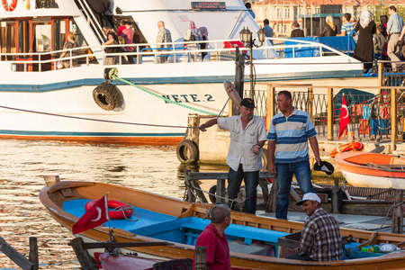 Istanbul, Turkey; May 26th 2013: Fishermen in the port of EyÃ¼p.のeditorial素材
