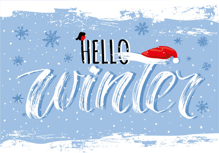 Hello Winter handlettering inscription. Winter elegant modern brush lettering on blue snowflake background. Hand drawn winter inspiration phrase. Vector illustrationのイラスト素材