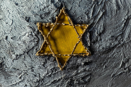 Star of David on a stone background. Holocaust conceptの写真素材