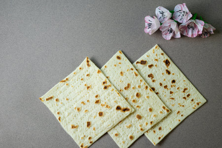 Pesah celebration concept (jewish Passover holiday). Traditional flatbread matzaの写真素材