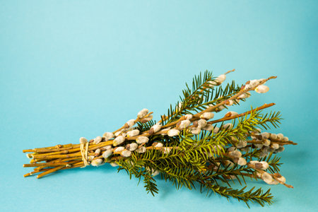 Decorative bouquet featuring willow branches and evergreen twigs, symbolizing Palm Sunday traditions , used in religious ceremoniesの写真素材