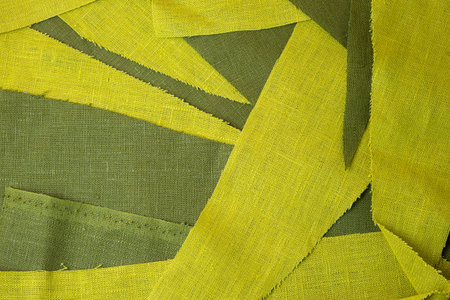 Fabric texture with yellow and green stripes. Textile background.